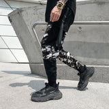 "BE YOURSELF" CAMO MESOL PANTS