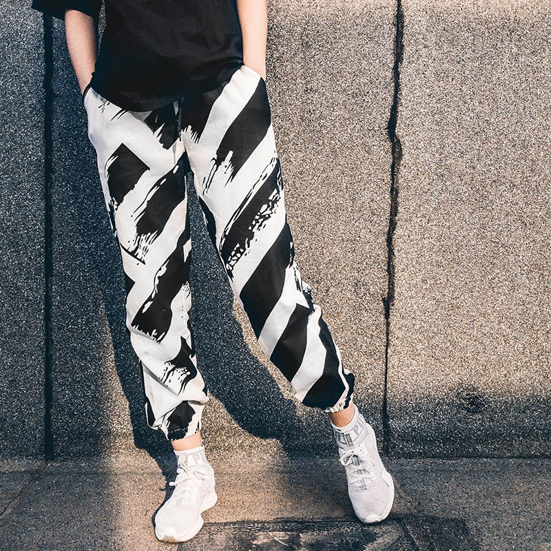 "ZEBRA" MESOL STRIPED PANTS