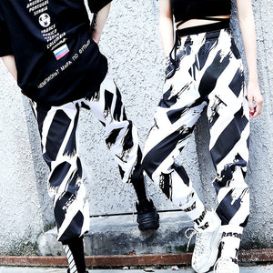 "ZEBRA" MESOL STRIPED PANTS