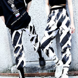 "ZEBRA" MESOL STRIPED PANTS